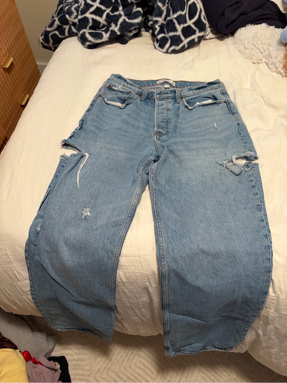 Women’s Light Blue Distressed 90s baggy low rise curve love jeans